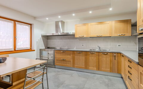 Elisa: Kitchen, Countertop, Cabinetry, Furniture, Flooring, Kitchen Appliance, Interior Design, Wood, Major Appliance, Floor