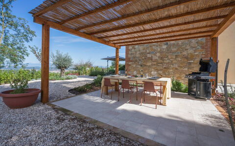 Punteriolo Spereto Family Apartment With Pool,: Plant, Table, Furniture, Flowerpot, Sky, Shade, Wood, Houseplant, Interior Design, Chair