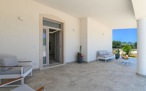 Villa Normanni: Plant, Houseplant, Building, Wood, Floor, Flooring, Shade, Door, Hardwood