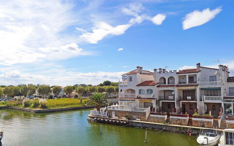 Port Mistral: Water, Building, Sky, Daytime, Property, Swimming Pool, Azure, Window, Tower Block, Plant