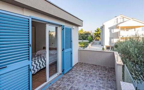 Victoria: Building, Property, Sky, Plant, Window, Blue, Door, Shade, Lighting