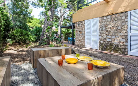 Platja Calafato: Building, Plant, Furniture, Table, Chair, Window, Shade, Tree, Orange, Outdoor Furniture