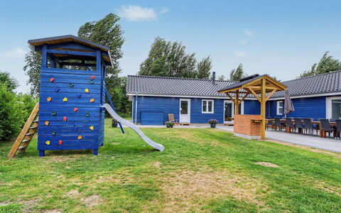 Rajna - 250M from the Sea: Blue, Shade, Cottage, Yard, Lawn, Garden, Landscaping, Backyard, Siding, Estate