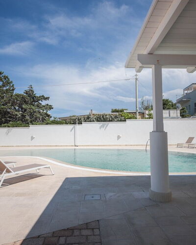 Villa Azzurra Seaview In Monopoli, Puglia: Water, Sky, Cloud, Plant, Swimming Pool, Tree, Shade, Leisure, Composite Material, Landscape