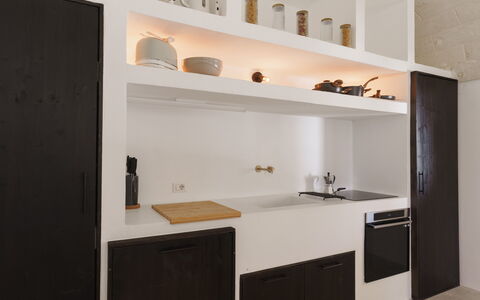 Villa Jolie: Kitchen, Interior Design, Countertop, Flooring, Cabinetry, Ceiling, Furniture, Lighting, Floor, Room