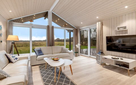 Corina - 850M to the Fjord: Ceiling, Interior Design, Living Room, Home, Couch, Light Fixture, Hardwood, Chair