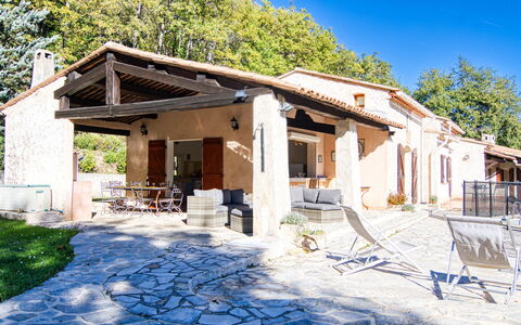 Villa Camille: Sky, Plant, Property, Blue, Building, Tree, Window, Shade, Door, Wood
