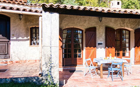 Villa Camille: Building, Furniture, Plant, Table, Window, Door, Chair, Tree, Shade, Leisure