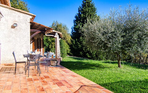 Villa Camille: Sky, Plant, Nature, Building, Natural Landscape, Tree, Land Lot, Road Surface, Grass, Wood