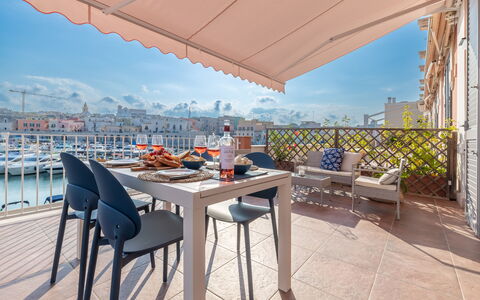 Sospiri Sul Mare: Sky, Table, Property, Furniture, Building, Chair, Cloud, Shade, Azure, Water