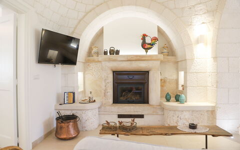 Country Trullo Rosso With Jacuzzi Alberobello: Property, Building, Interior Design, Wood, Table, Living Room, Floor, Flooring, Hearth, Couch