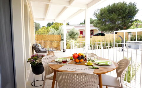 Apartments In Villa Selva, Locorotondo, Puglia: Table, Furniture, Plant, Property, Chair, Building, Tableware, Flowerpot, Outdoor Table, Textile