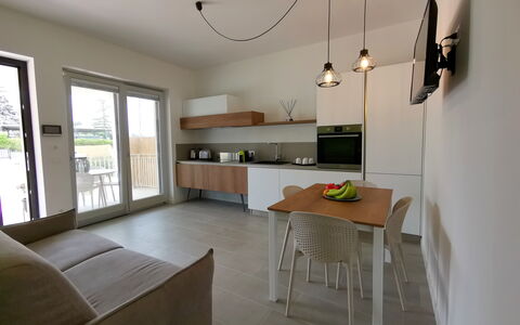 Apartments In Villa Selva, Locorotondo, Puglia: Table, Furniture, Cabinetry, Window, Building, Plant, Wood, Countertop, Architecture, Interior Design