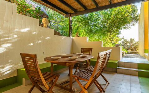 Capo Boi: Furniture, Table, Property, Building, Chair, Plant, Wood, Shade, Interior Design, Outdoor Furniture