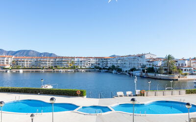 Empuriabrava 918: Water, Sky, Plant, Water Resources, Blue, Building, Swimming Pool, Condominium, Urban Design, Coastal And Oceanic Landforms