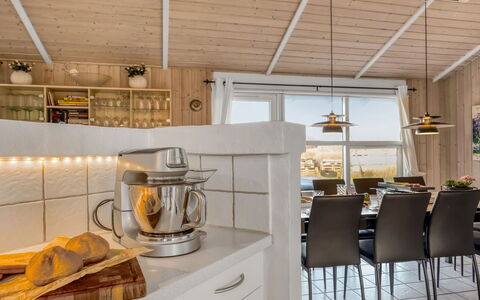 Adrienne - 490M from the Sea: Wood, Interior Design, Ceiling, Furniture, Kitchen, Countertop, Room, Light Fixture, Kitchen & Dining Room Table, Cabinetry