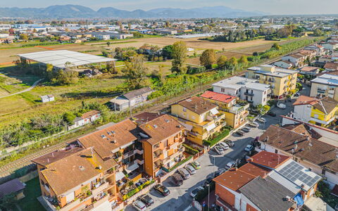 Menesini: Building, Sky, Property, Window, House, Urban Design, Plant, Neighbourhood, Residential Area, Cityscape
