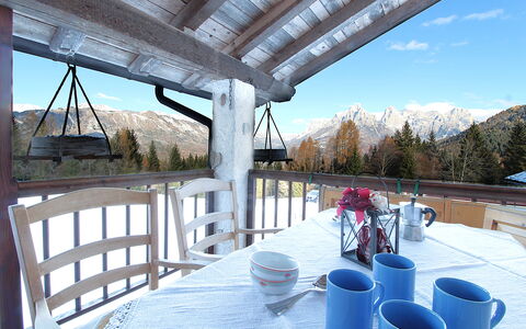 Baita Mountain View Pale San Martino: Sky, Property, Tableware, Table, Tree, Porch, Cloud, Shade, Leisure, Fence