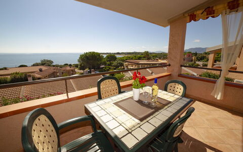 Bilocale Apartments Seaside: Furniture, Apartment, Balcony, Shade, Chair, Resort, Kitchen & Dining Room Table, Houseplant, Eco Hotel, Wood Stain