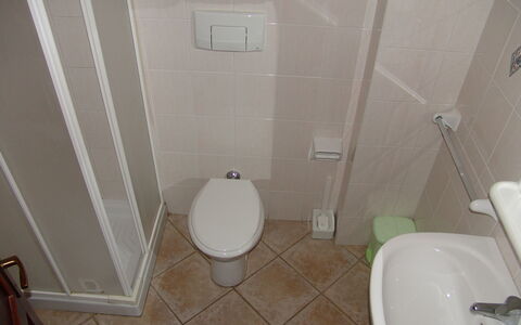 Bilocale Apartments Seaside: Bathroom, Toilet Seat, Toilet, Plumbing Fixture, Wall, Flooring, Floor, White, Plumbing, Interior Design