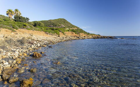 Villetta Seaside Sardegna: Blue, Water, Body Of Water, Coast, Rock, Coastal And Oceanic Landforms, Sea, Natural Landscape, Horizon, Shore