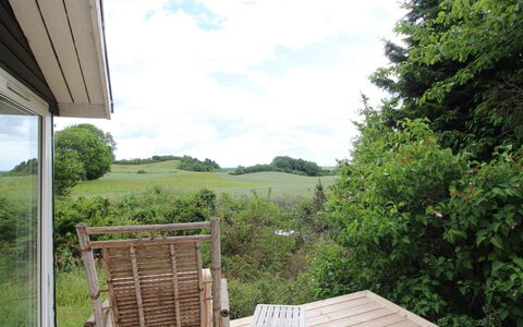 Mielikki - 2Km from the Sea: Wood, Furniture, Shrub, Outdoor Furniture, Land Lot, Porch, Chair, Garden, Cottage