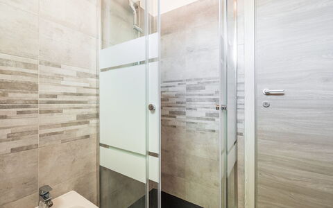 Doxina: Flooring, Floor, Bathroom, Plumbing Fixture, Tile, Shower Door, Toilet, Plumbing