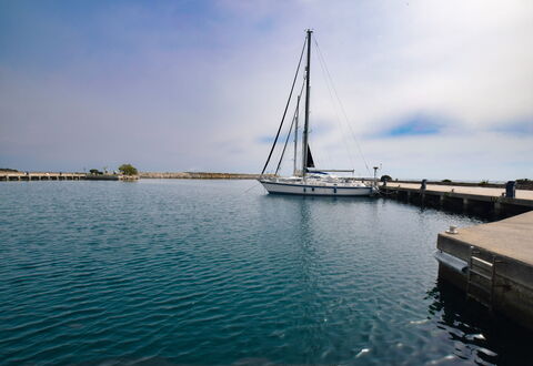 Casa Ada In Budoni: Water, Sky, Cloud, Boat, Lake, Horizon, Mast, Calm, City, Vehicle