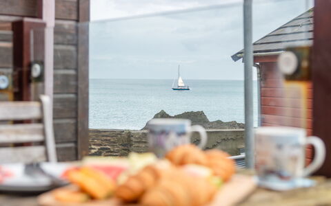 Harbourside Hideaway: Wood, Sea, Ocean, Coast, Cottage, Shore, Beach, Shade, Chair, Outdoor Furniture