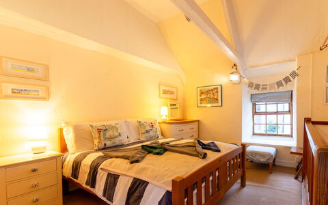 Piskey Cottage: Bed, Furniture, Interior Design, Bedroom, Bedding, Wall, Bed Sheet, Floor, Flooring, Wood