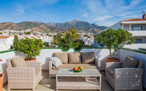 Parador del Mar: Cloud, Sky, Furniture, Plant, Building, Flowerpot, Couch, Azure, Blue, Houseplant