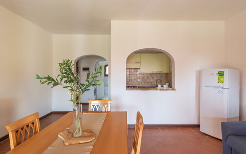 Apartments In Country Village Near Stintino: Interior Design, Flooring, Floor, Ceiling, Furniture, Kitchen & Dining Room Table, Room, Wood Stain, Apartment, Dining Room