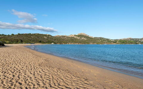 Casa Faro Green Village Sardegna: Water, Cloud, Sky, Water Resources, Azure, Beach, Tree, Natural Landscape, Coastal And Oceanic Landforms, Bank