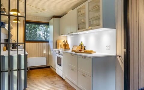 Star - 600M from the Sea: Kitchen, Countertop, Wood, Cabinetry, Interior Design, Kitchen Appliance, Flooring, Ceiling, Major Appliance, Cupboard
