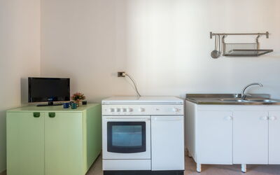Casa Arangiu 2 647.2: Flooring, Floor, Major Appliance, Interior Design, Kitchen, Kitchen Appliance, Cabinetry, Room, Furniture, Kitchen Stove