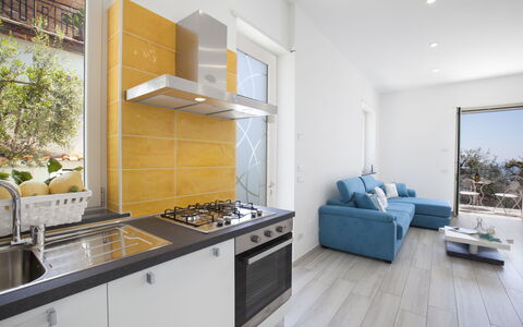 Villa Neranyum: Kitchen, Flooring, Interior Design, Major Appliance, Furniture, Wood, Kitchen Appliance, Countertop, Floor, Room