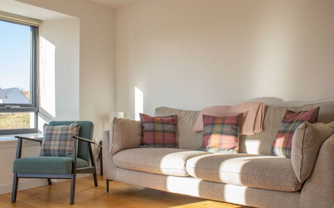Carbost Cottage: Furniture, Apartment, Living Room, Couch, Chair, Wood Stain, Pillow, Daylighting