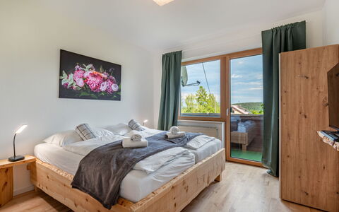 Villa Therese: Pillow, Hardwood, Bedroom, Hotel, Bed, Throw Pillow, Suite, Bedding, Penthouse Apartment