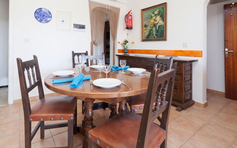 La Tuna 6: Table, Furniture, Picture Frame, Building, Wood, Chair, House, Flooring, Floor, Door
