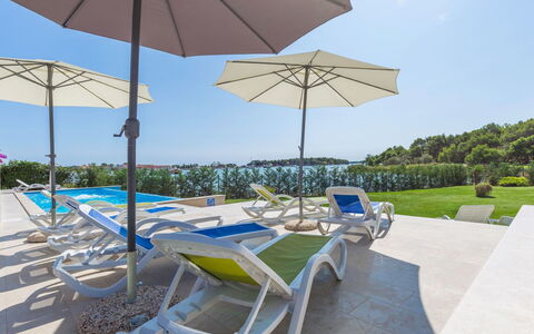 Villa Vizula: Blue, Outdoor Furniture, Swimming Pool, Shade, Chair, Umbrella, Sunlounger, Garden, Leisure, Resort