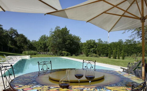 Mulino della Villa: Furniture, Garden, Shade, Chair, Outdoor Furniture, Water Feature, Landscaping, Pond, Swimming Pool, Yard