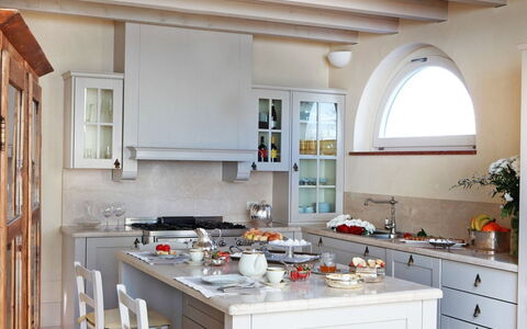 Villa le Selve: Furniture, Kitchen, Interior Design, Countertop, Flooring, Kitchen Appliance, Cabinetry, Home, Lighting, Ceiling