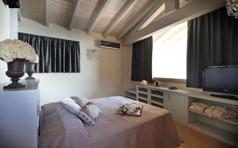 Villa le Selve: Furniture, Interior Design, Bed, Bedroom, Ceiling, Wood, Flooring, Bed Sheet, Room, Bedding
