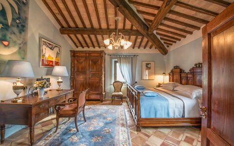 Villa Giuncheto: Furniture, Wall, Interior Design, Flooring, Bedroom, Lighting, Home, Table, Bed, Floor