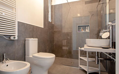 Villa Baia al Mare: Toilet Seat, Bathroom, Toilet, Plumbing Fixture, Flooring, Floor, Wall, Interior Design, Sink, Bathroom Sink