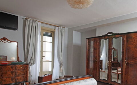 Villa Garda: Furniture, Interior Design, Wood, Flooring, Bedroom, Room, Lighting, Floor, Bed, Picture Frame