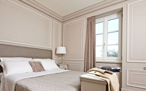 Villa Garda: Interior Design, Furniture, Bedroom, Bed, Wood, Bed Sheet, Home, Bedding, Flooring, Floor
