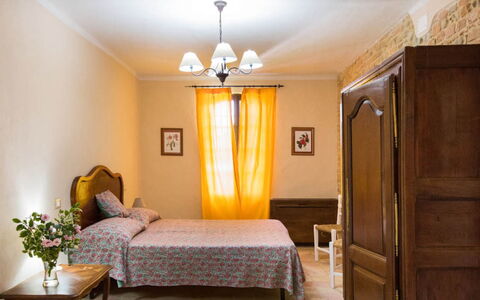 Cascina del Castello: Furniture, Wall, Interior Design, Wood, Flooring, Floor, Bedroom, Textile, Room, Bed
