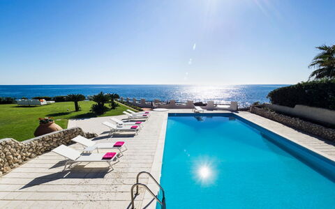 Villa Luna Blu: Blue, Water, Sea, Outdoor Furniture, Leisure, Coastal And Oceanic Landforms, Swimming Pool, Ocean, Coast, Resort