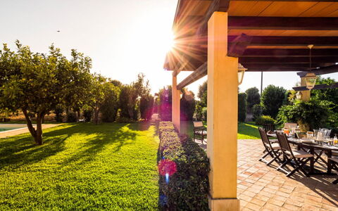 Villa del Sirio: Garden, Shrub, Land Lot, Lawn, Shade, Landscaping, Backyard, Resort, Yard